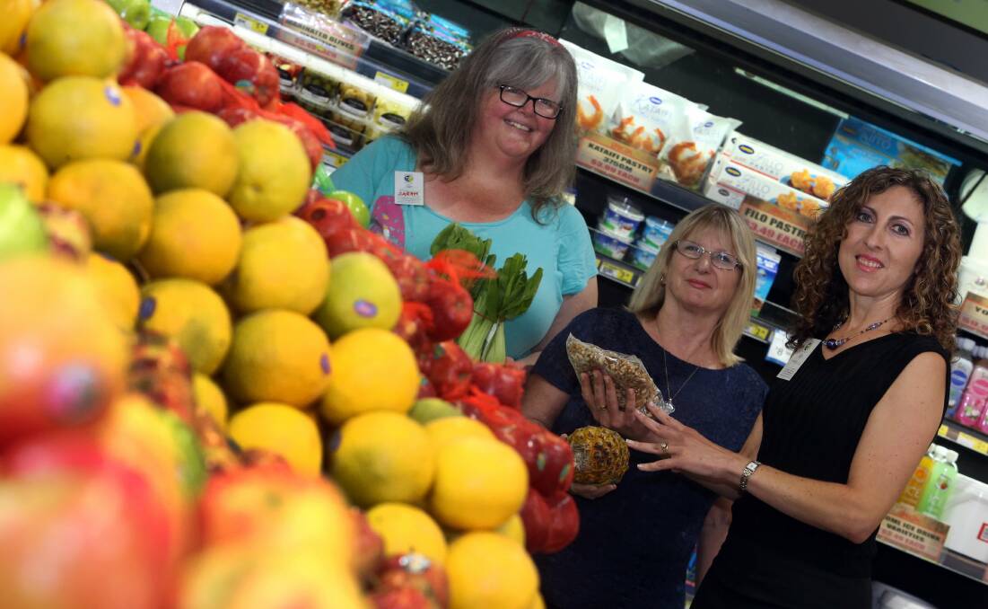 Sarah Jackson, Margaret Lubrano and nutritionist Renee Lintescu shopping for healthy food options. Picture: ROBERT PEET