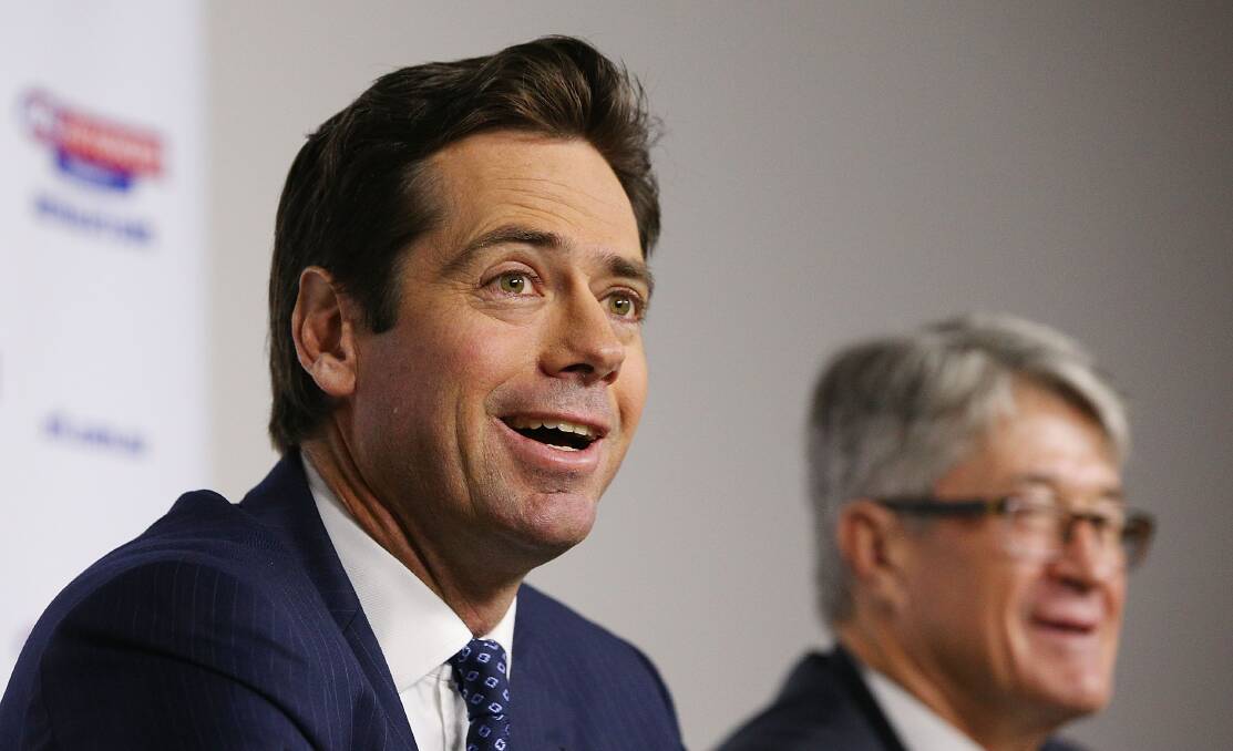 New AFL CEO Gillon McLachlan and Commission Chairman Mike Fitzpatrick react to the media during an AFL press conference at AFL House on Wednesday. Picture: MICHAEL DODGE - GETTY IMAGES
