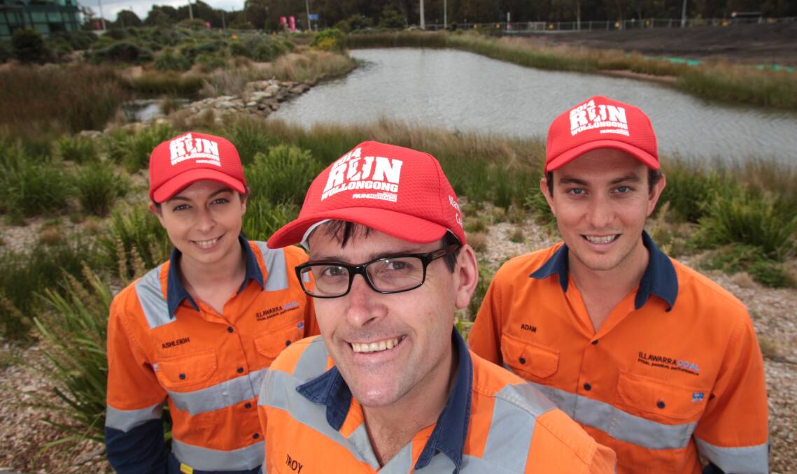 Ashleigh Hammet with Illawarra Coal president Troy McDonald and Adam West.  Run Wollongong has proved popular with employees. Picture: ADAM McLEAN