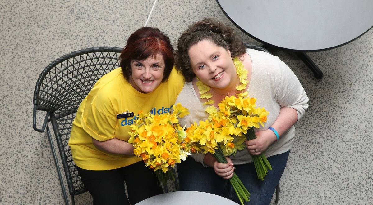 Connie Wilson and Natalie Wall will be selling daffodils and other merchandise as part of the 29th annual Daffodil Day. Picture: GREG TOTMAN
