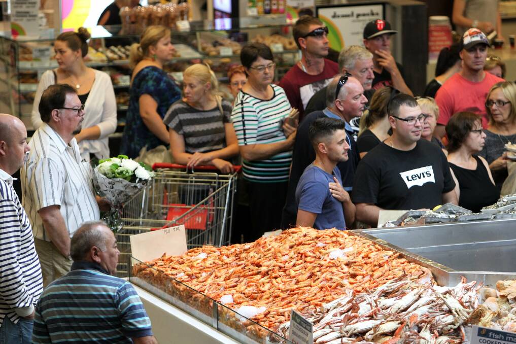 Seafood was a favourite with shoppers at Shellharbour Square on Christmas Eve. Picture: GREG TOTMAN