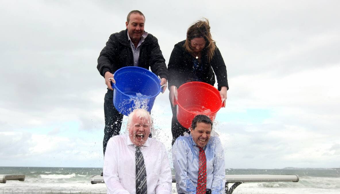 State MPs Gareth Ward and Ryan Park take part in the Ice Bucket Challenge.                       Picture: SYLVIA LIBER