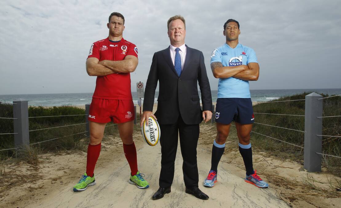 ARU boss Bill Pulver, flanked by James Horwill and Israel Folau. Picture: LOUISE KENNERLEY