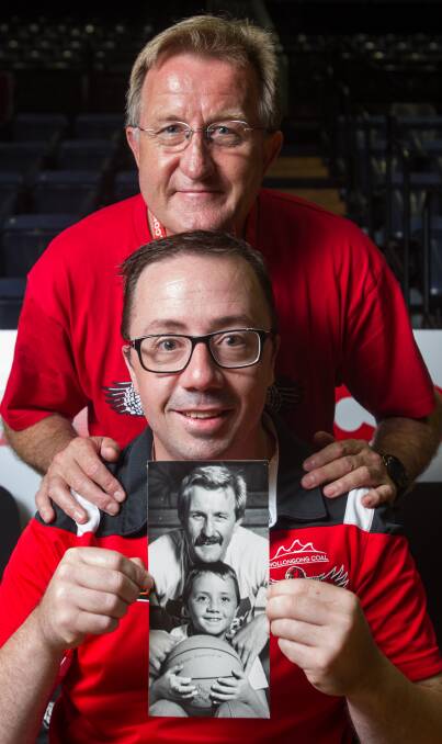 Gordie McLeod and Joel Armstrong with the 1986 picture. Picture: CHRISTOPHER CHAN