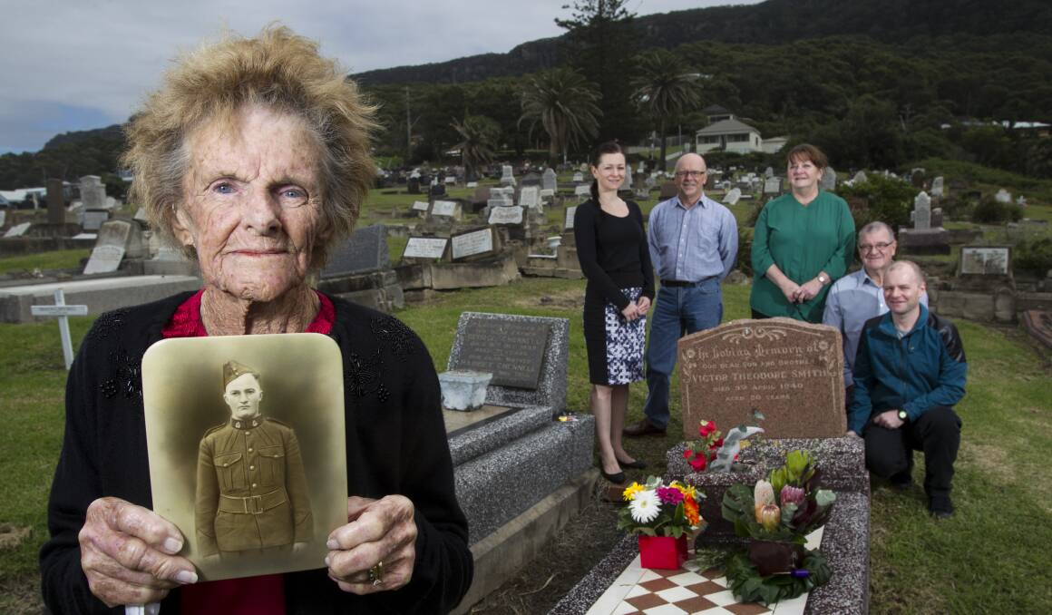 Family of Victor Theodore Smith –  sister-in law Audrey Smith (front), Amanda Owers, Lawrence Smith, Vicki Owers, Ben Owers and Graeme Owers – commemorate the 75th anniversary of his  death  as the first Australian to die in WWII. Picture: CHRISTOPHER CHAN