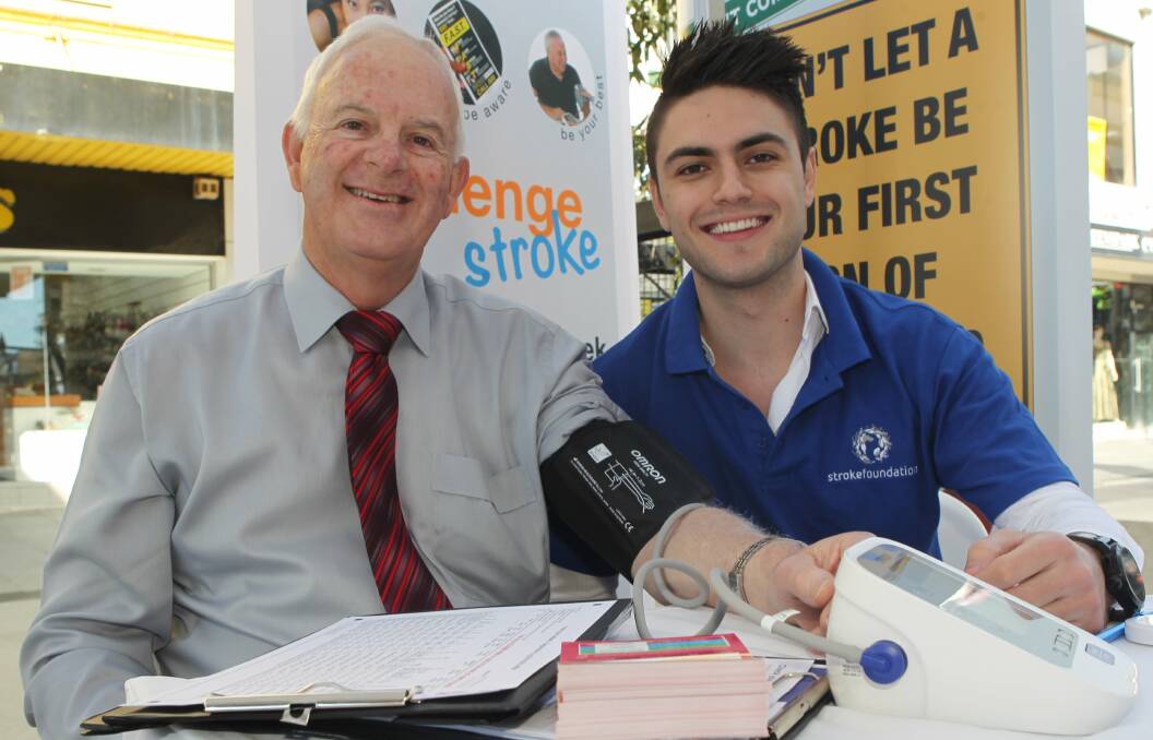 Wollongong Deputy Lord Mayor Chris Connor visiting the Wollongong Stroke Week event at Crown Street Mall with pharmacist Matt Schlegel. Picture: GREG TOTMAN