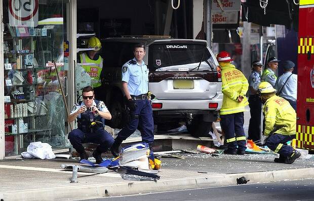 The scene at Kogarah where a car left the road and went through a chemist shop window. Picture: John Veage

