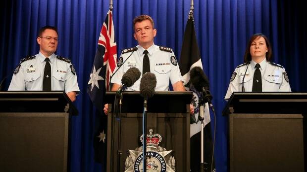 AFP Commissioner Andrew Colvin (centre), AFP Deputy Commissioner Mike Phelan (left) and AFP Deputy Commissioner Leanne Close (right) address the media on the organisation's work during the Bali Nine investigation. Picture: Alex Ellinghausen