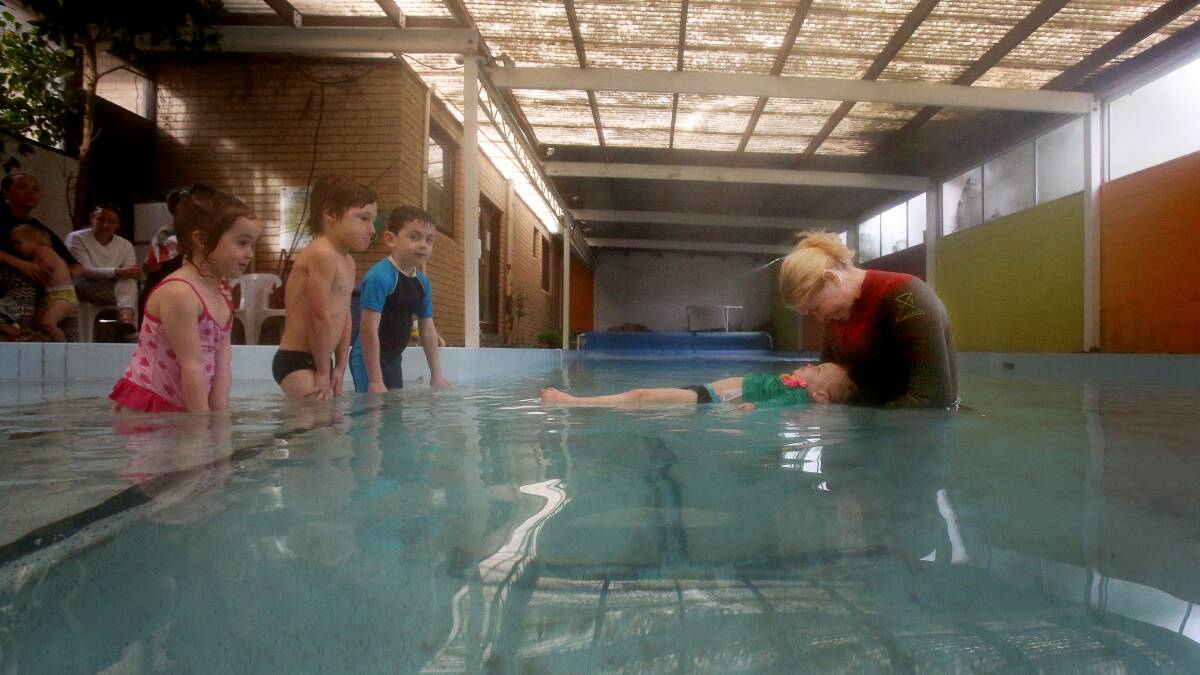 Sharon Crisafi with learn to swim students. Picture: ROBERT PEET