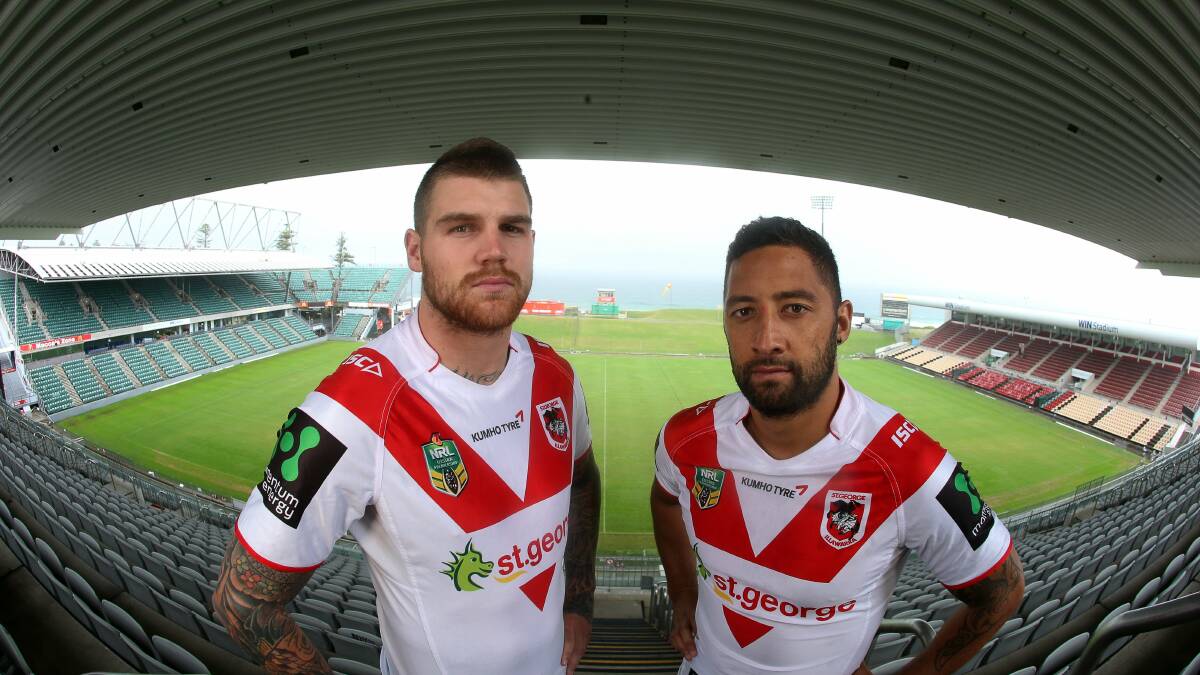 Dragons players Josh Dugan and Benji Marshall take in the view from the top of the WIN Stadium western grandstand ahead of Saturday’s clash with the Sea Eagles. It will be St George Illawarra’s first home game this year and the club’s 100th at the coastal venue. Picture: ROBERT PEET