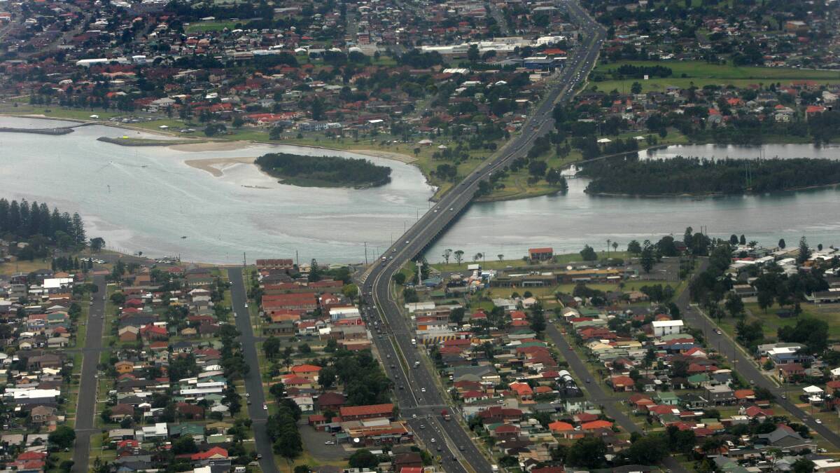 Windang Bridge had separated Shellharbour City Council area (top), which qualifies as a regional area, and metropolitan Wollongong City Council.
