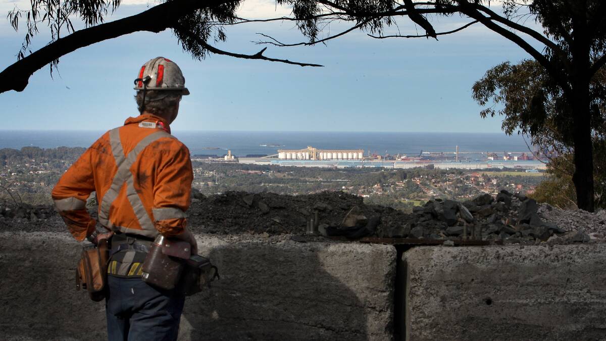 A miner looks at the view from  Dendrobium Mine.