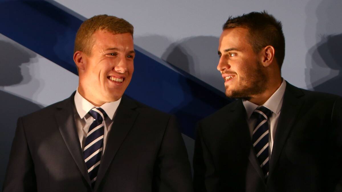 Trent Hodkinson and Josh Reynolds. Picture: GETTY IMAGES