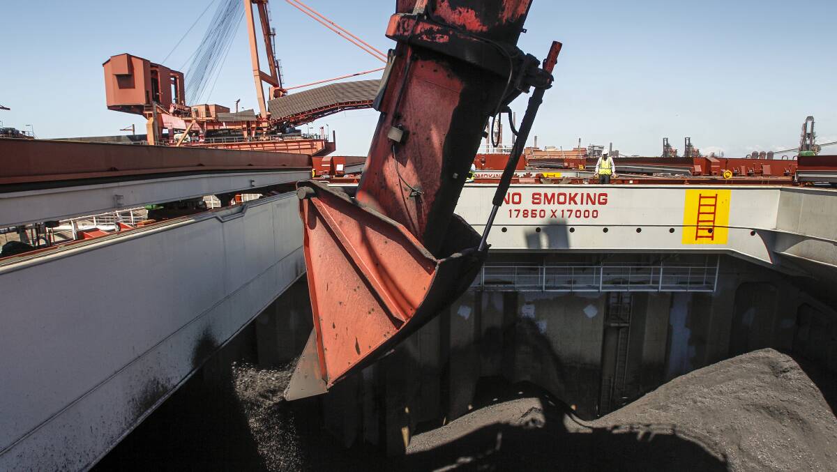 Coal is being loaded onto a ship at Port Kembla Coal Terminal.