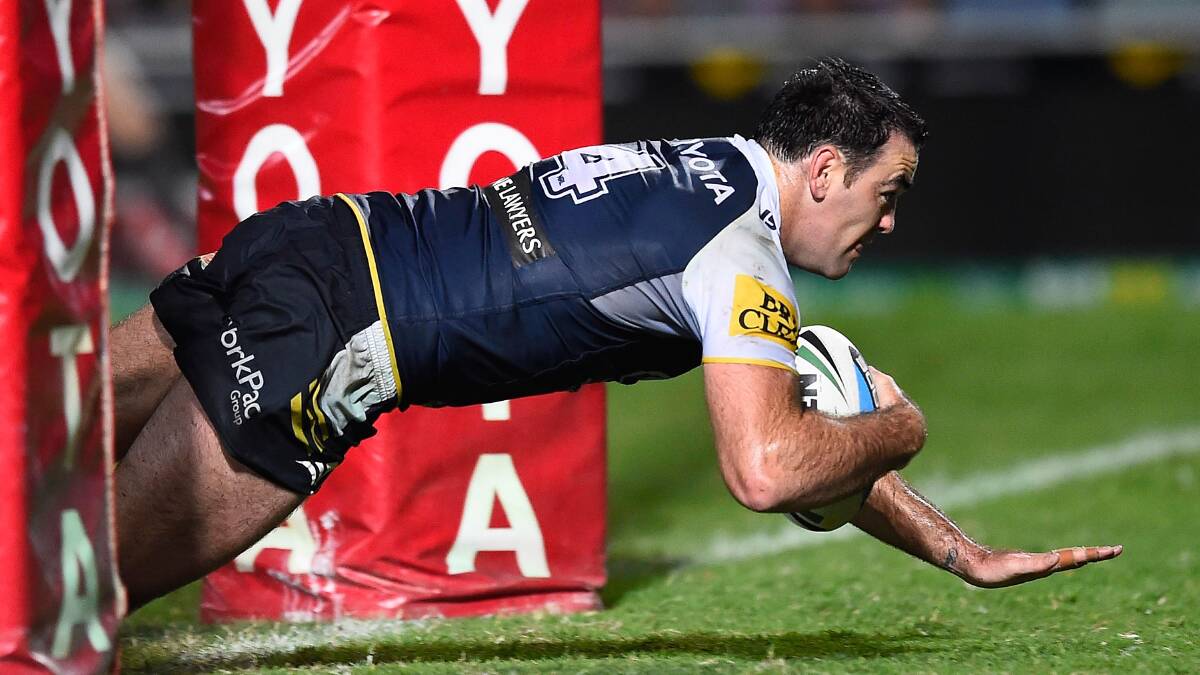 Kane Linnett, of the Cowboys, scores under the posts as his team beat the Parramatta Eels at 1300SMILES Stadium in Townsville on Monday night. Picture: GETTY IMAGES