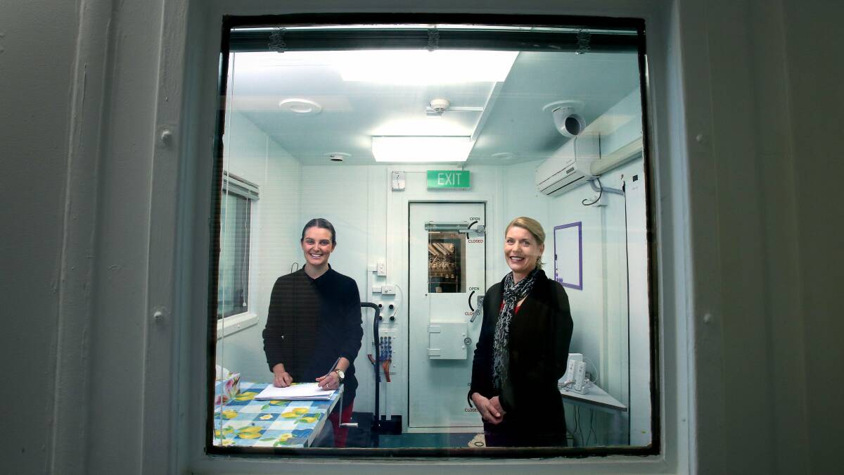 Research leader Dr Anne-Maree Parrish (left) with assistant Anisse Penning in the ‘‘calorimeter room’’. Picture: KIRK GILMOUR
