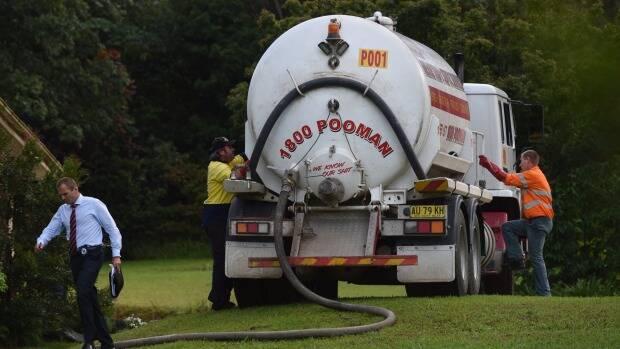 A septic service truck at the property in the search for the toddler. Picture: NICK MOIR