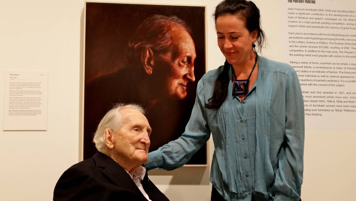 Portrait of Tom Uren with his Archibald Prize portrait, and the artist who painted the work, Mirra Whale. Picture: DALLAS KILPONEN