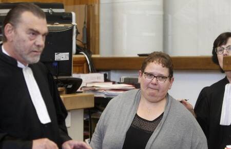 French woman Dominique Cottrez with her lawyer in court on Thursday. Picture: AP