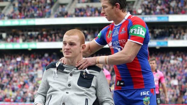 "I don't know whether I've come to peace. I reckon every day I ask myself the same thing": Alex McKinnon and Kurt Gidley, pictured last year, during the NRL's "Rise For Alex" round. Pictre: TONY FEDER