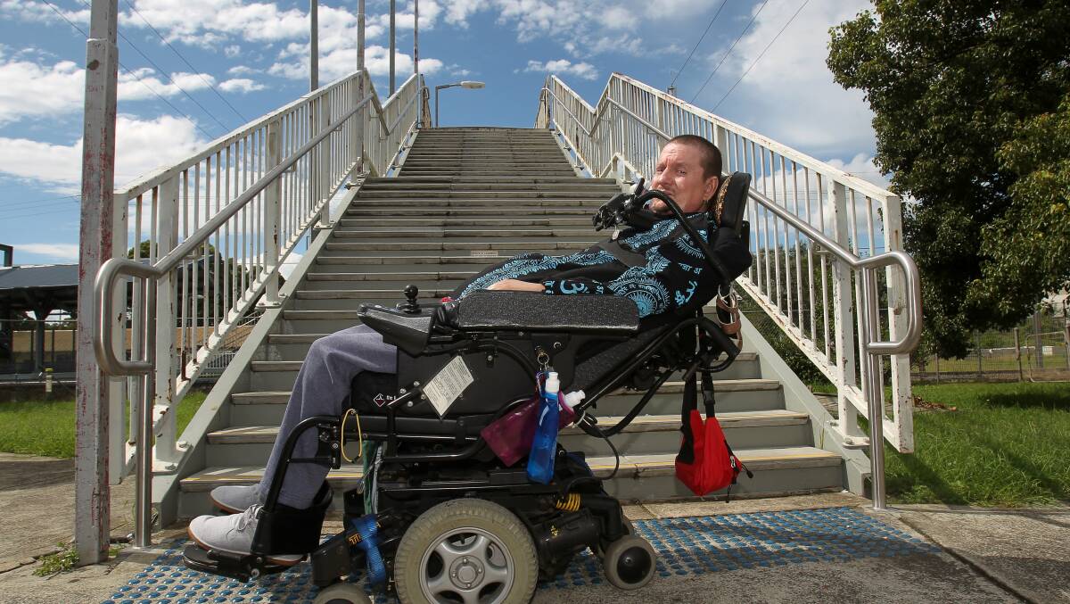 Richard Kramer has been campaigning for lifts to be installed at Unanderra railway station. Picture: GREG TOTMAN
