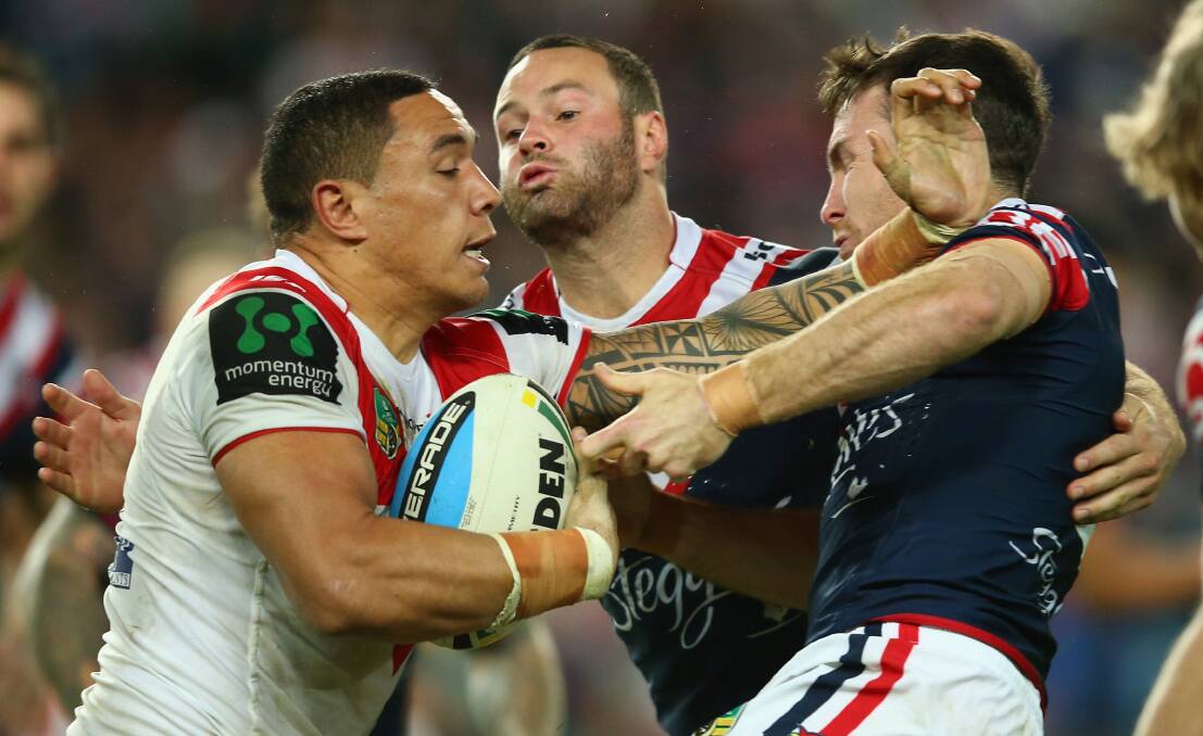 yson Frizell of the Dragons is tackled by Boyd Cordner and James Maloney of the Roosters during the match between the St George Illawarra Dragons and the Sydney Roosters at Allianz Stadium on Monday night. GETTY IMAGES