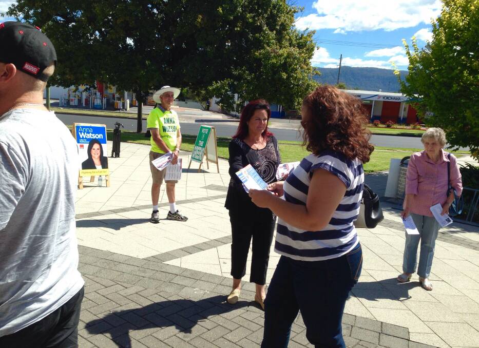 Shellharbour MP Anna Watson handing out how-to-vote cards at the Dapto Ribbonwood Centre.Picture: GREG TOTMAN