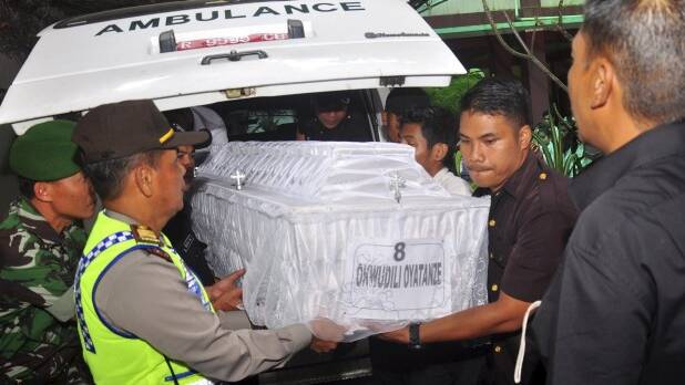 Members of Indonesian security carry the coffin containing the body of executed Nigerian Okwudili Oyatanze at an orphanage in Central Java. Picture: REUTERS