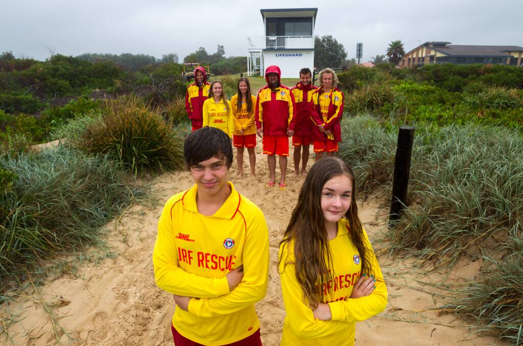 Kalyan Bruton-Waite and Chiahni Zulian (front) with members of Towradgi Surf Life Saving Club. Picture:CHRISTOPHER CHAN