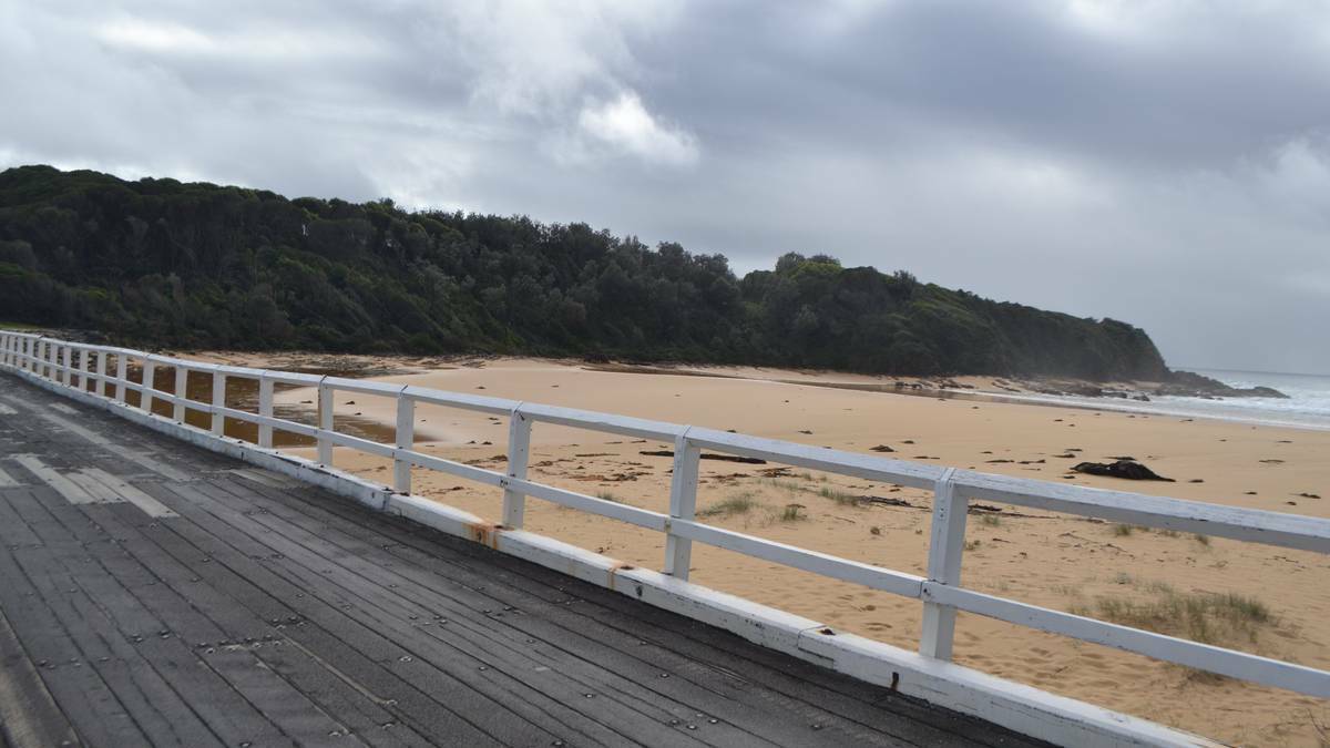 The headland north of the Cuttagee bridge closed off by police. Picture: STAN GORDON