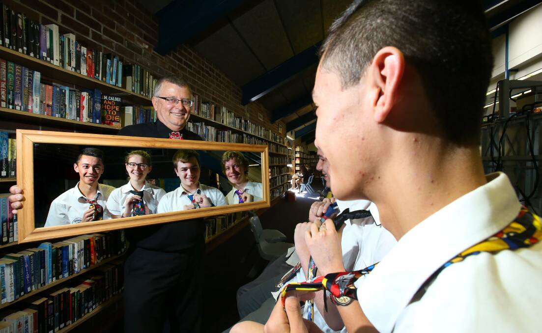 Retiring deputy principal Rodney Zabell reflects on cutting ties with Smith’s Hill High School, pictured with Year 12 students Josh Cornford. Elizabeth Heffernan, Dylan Severn and Tim Denham. Picture: KIRK GILMOUR