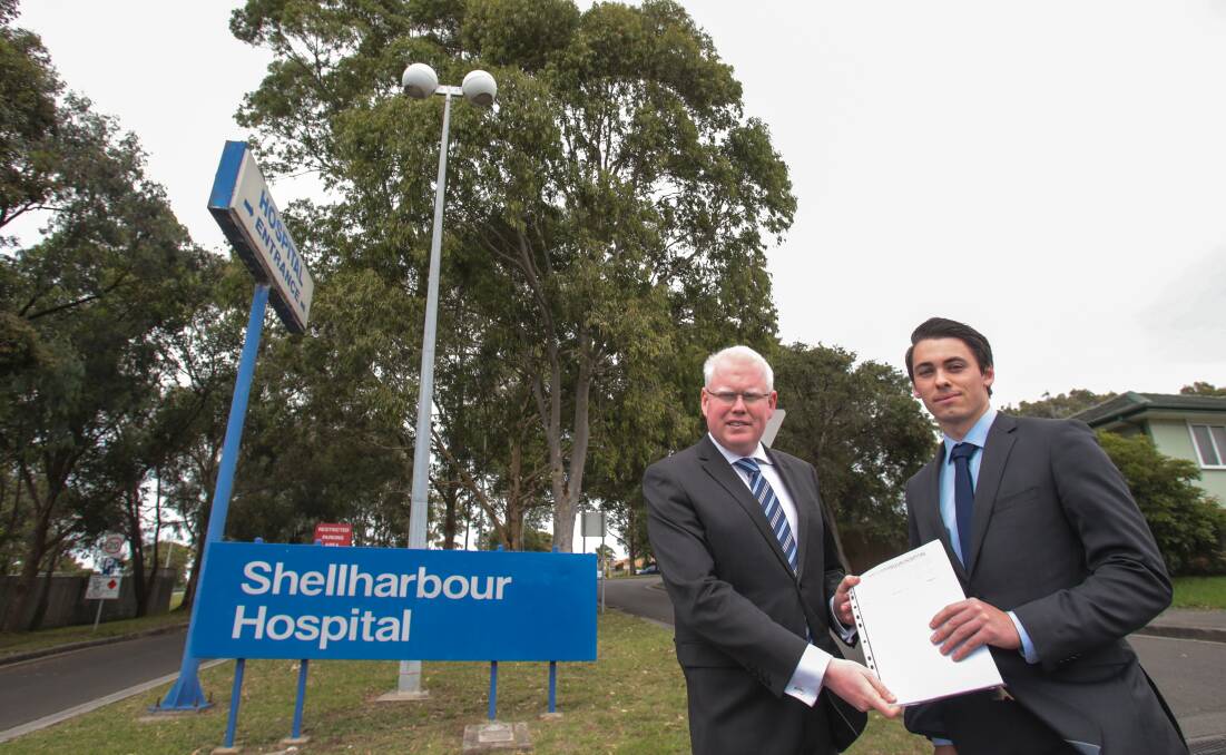 Member for Kiama Gareth Ward and Liberal Candidate for Shellharbour Mark Jones outside Shellharbour Hospital in October 2014 to launch a petition calling on the NSW Government to fully fund the upgrade of Shellharbour Hospital. Picture: ADAM McLEAN