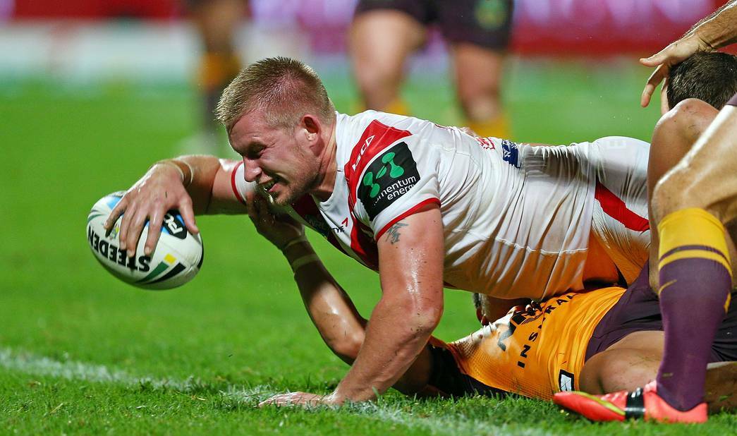Dragons prop Mike Cooper drives over in his side's 12-10 win over the Broncos last Friday. Picture: GETTY IMAGES