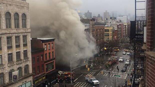 Smoke pours from a building after it collapsed after a massive blaze in New York City's East Village. Photo: REUTERS