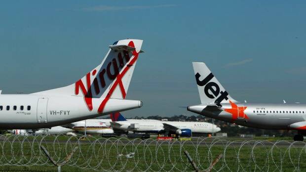 Grounded: Jetstar and Virgin have delayed flights to and from Bali again. Picture: LOUISE KENNERLEY