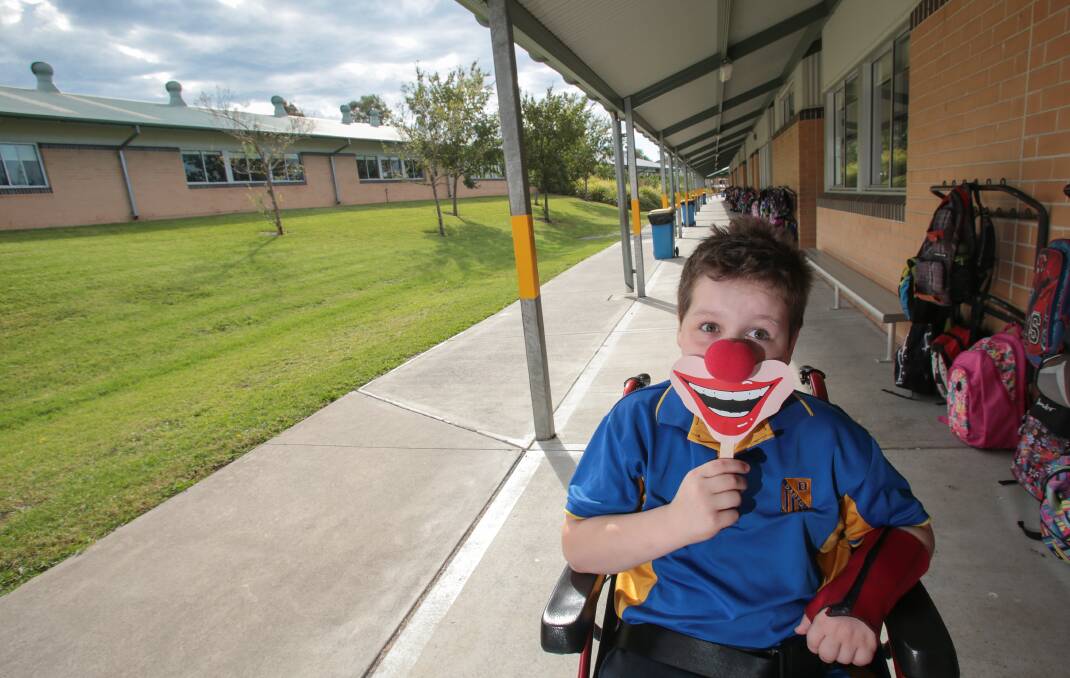Dapto Public School student James Wheeler, age 10, is supporting the 'silly selfie' campaign to raise money for clown doctors who work with sick kids in hospital. Picture: ADAM McLEAN.