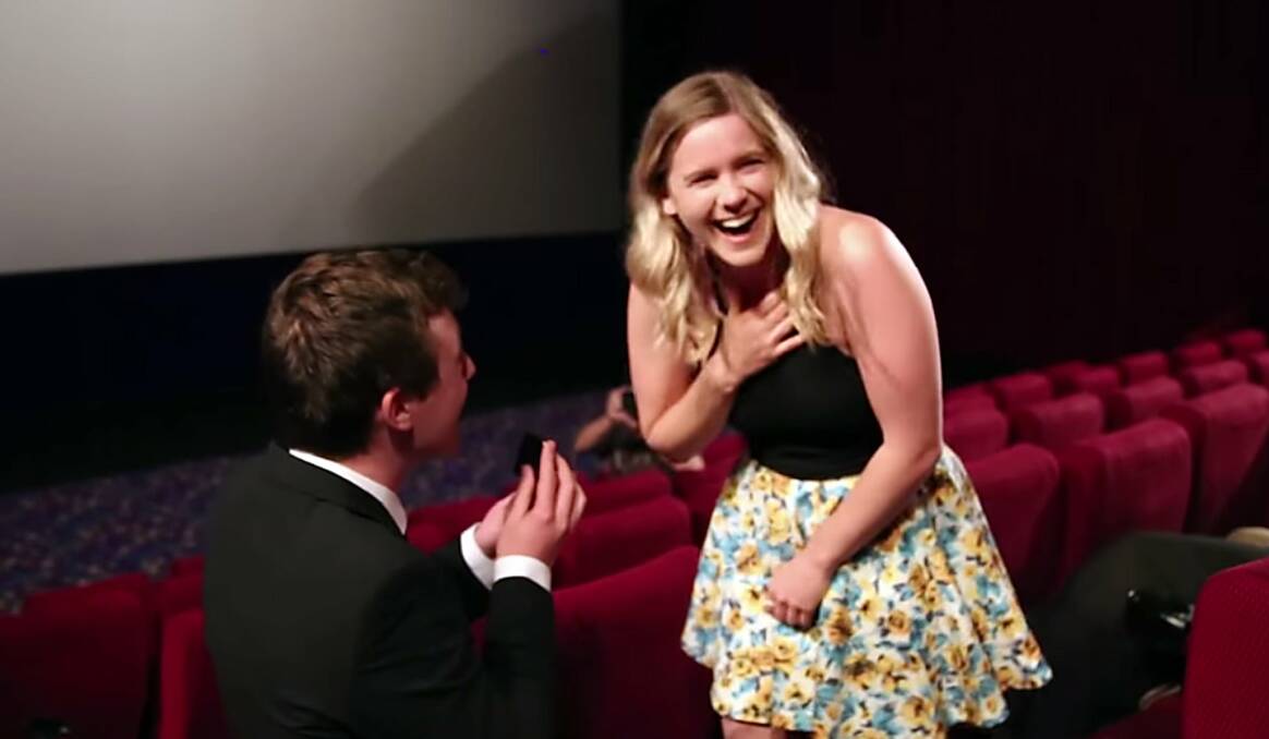 Mount Keira's Liam Cooper staged an ultra-elaborate big screen proposal to his long-time girlfriend Amy Smith at the movies. The romantic video has gone viral on social media.