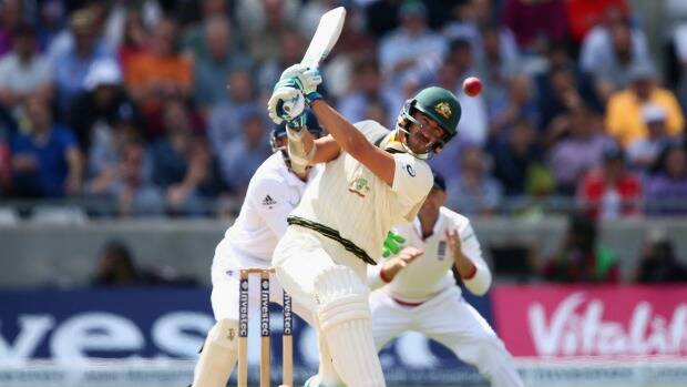 Lusty hitting: Mitchell Starc hits straight off a delivery from Moeen Ali. Picture: GETTY IMAGES
