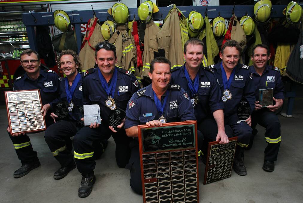 Fire and Rescue NSW Wollongong station members (l to r) Andrew Clark, Mark McMaster, Justin Taylor, Andrew Barber, John Robinson, Stuart Willick and Dave Elliott have been crowned 2015 Australasian rescue champions. Picture: GREG TOTMAN