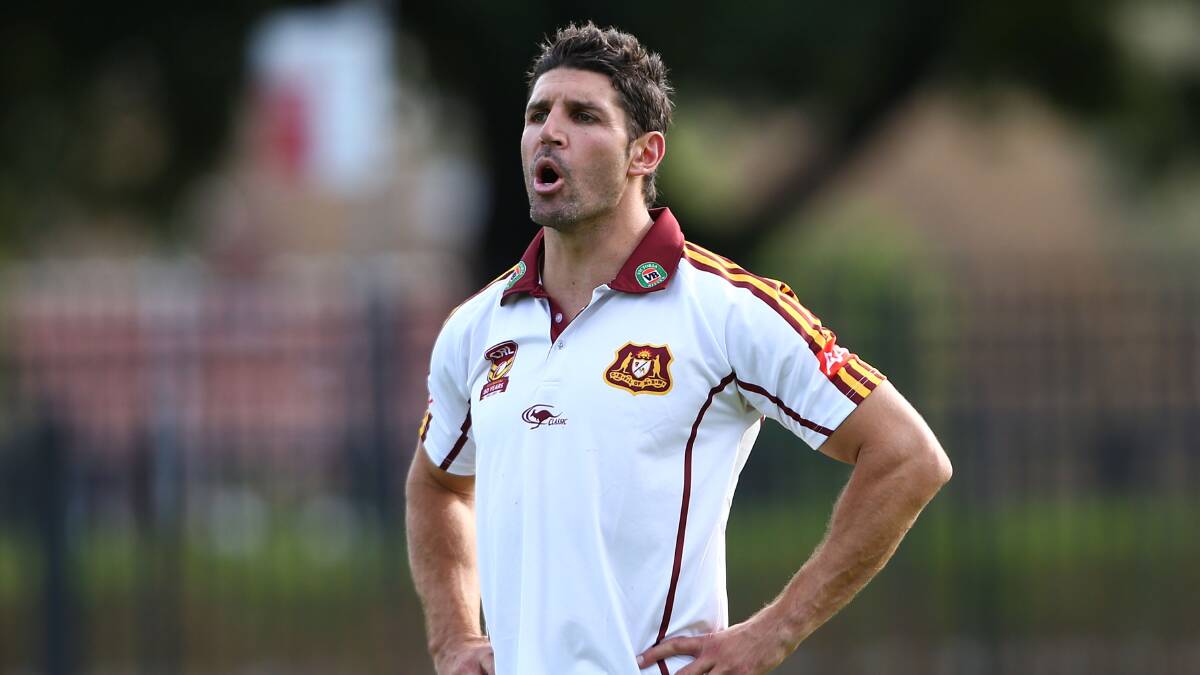Trent Barrett is ready for the step up to NRL coaching according to former teammate Jason Ryles. Photo: Getty Images