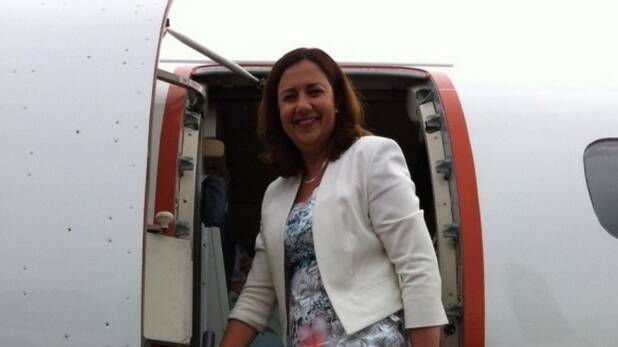 Opposition Leader Annastacia Palaszczuk boards a flight on one of her campaign visits Cairns. Photo: Tony Moore
