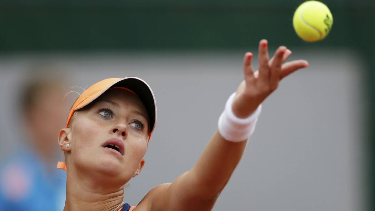 France's Kristina Mladenovic serves during her first round upset over China's No 2 seed Li Na at the French Open. Picture: REUTERS