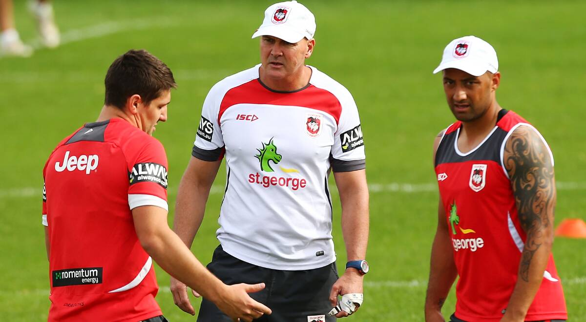 St George Illawarra halves Gareth Widdop (left) and Benji Marshall (right) at training with coach Paul McGregor. Picture: GETTY IMAGES