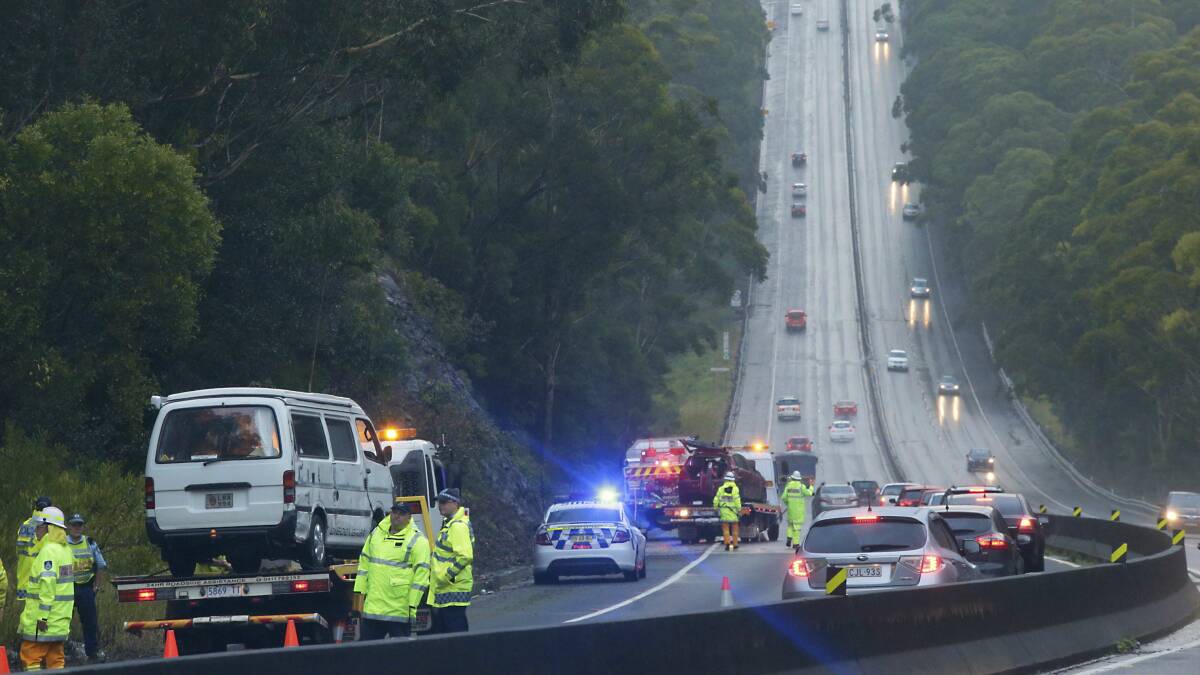 A multiple car pile-up on Mount Ousley Road led to south-bound traffic being temporarily diverted via Bulli Pass. Pictures: ADAM McLEAN