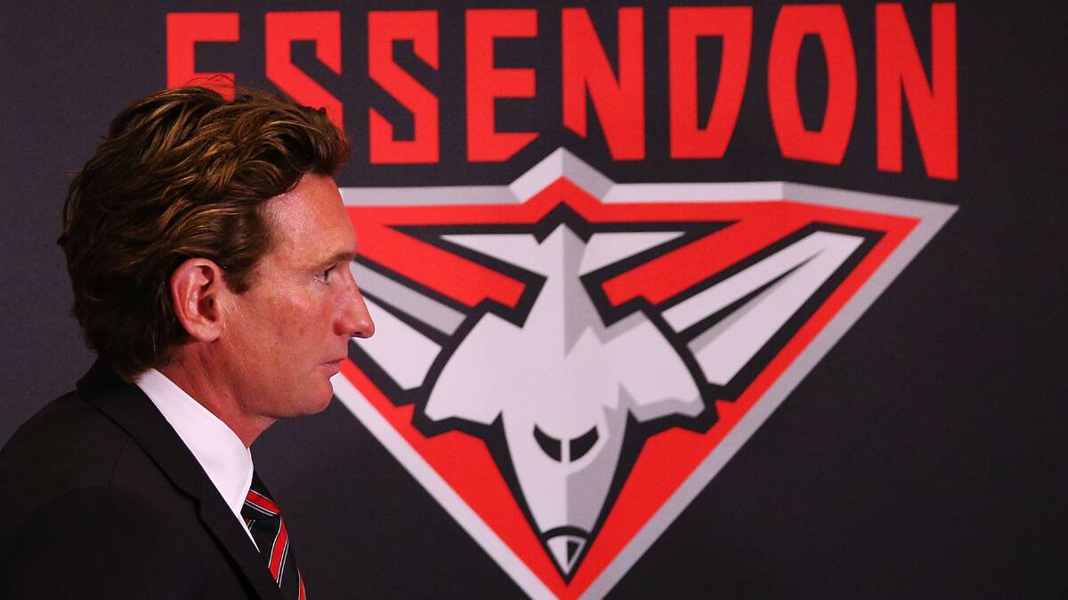 Head coach James Hird leaves after speaking to media at Essendon Bombers headquarters after his players were found not guilty by the AFL's anti-doping tribunal.  Picture: GETTY IMAGES