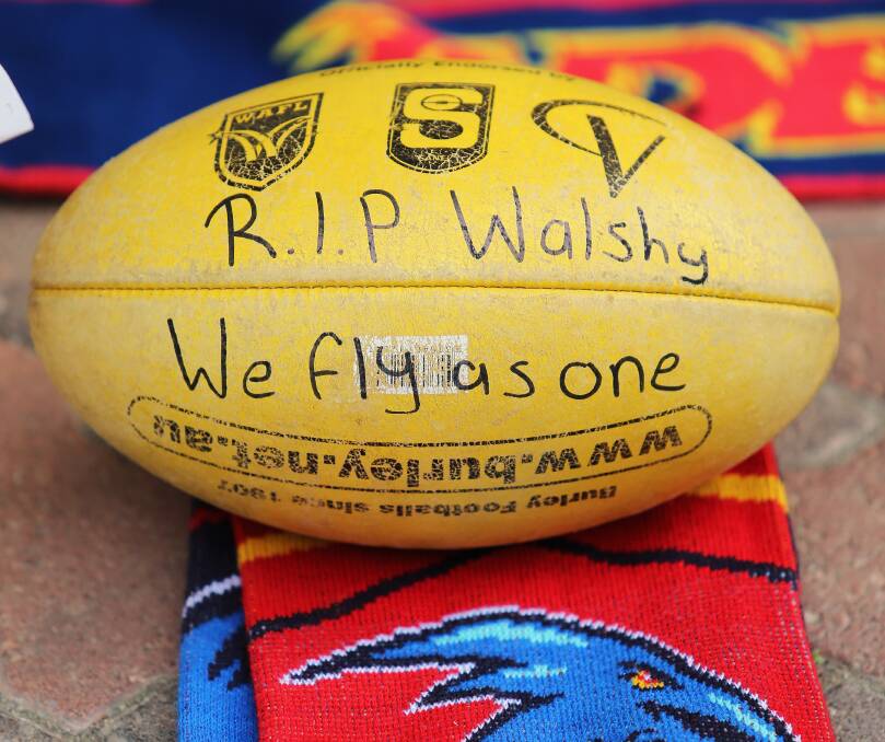 Tributes to the Crows late head coach Phil Walsh at AAMI Stadium on Friday. Picture: GETTY IMAGES