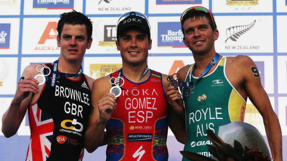 Wollongong's Aaron Royle (right), Jonathan Brownlee of Great Britain and Javier Gomez of Spain pose with their medals after competing in the ITU World Triathlon elite men's race on Sunday in Auckland. Picture: GETTY IMAGES