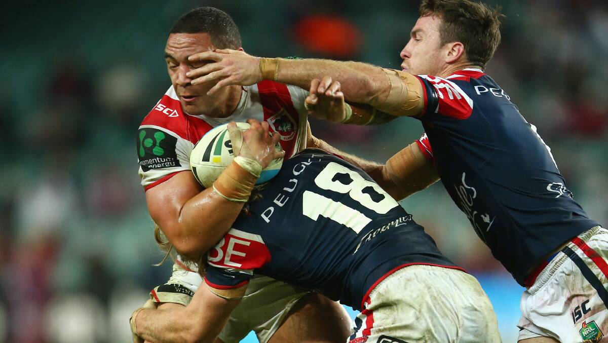 Dragons forward Tyson Frizell is under pressure from the Roosters defence in Monday night's NRL match at Allianz Stadium. Picture: GETTY IMAGES