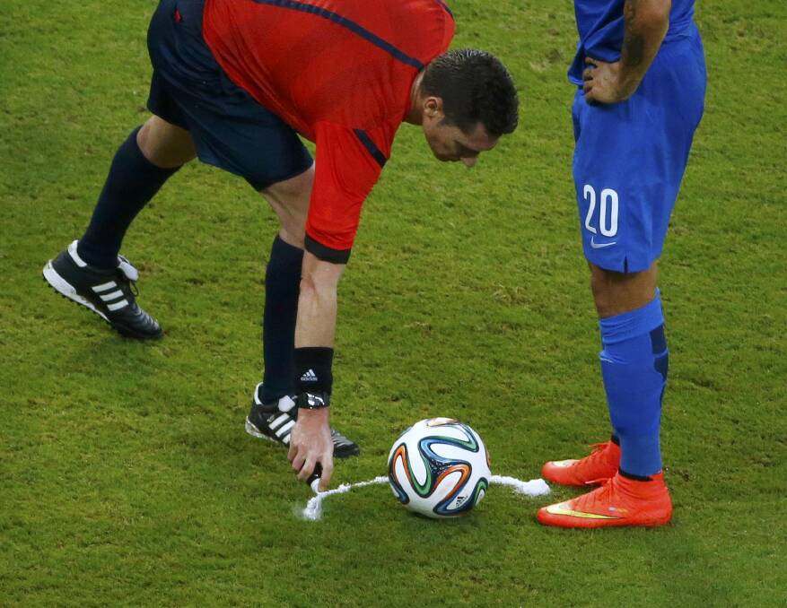 The vanishing spray used by refereees at the World Cup in Brazil has been a major success. Picture: GETTY IMAGES