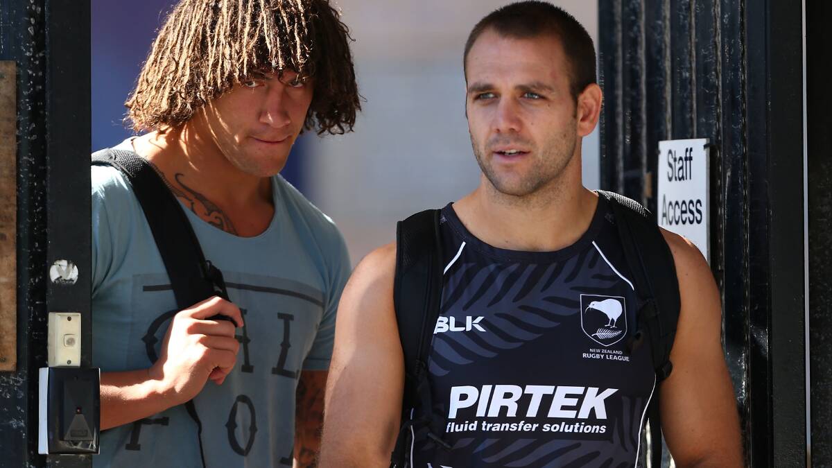 Kevin Proctor (left) with Dragons player Jason Nightingale at the Kiwis training camp last week. Picture: GETTY IMAGES
